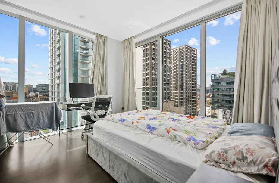 Corner bedroom with full-height windows